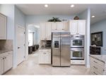 Gourmet Kitchen w stainless Steel Appliances and Granite Countertops and 10` Ceilings